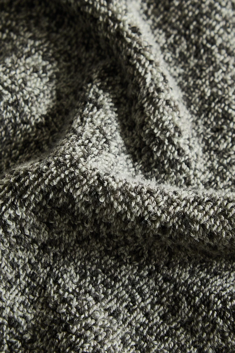 BATH TOWEL WITH A MELANGE-EFFECT