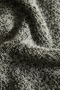BATH TOWEL WITH A MELANGE-EFFECT