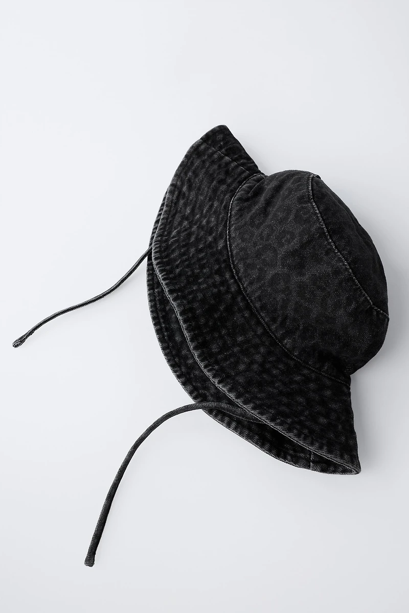 DENIM ANIMAL PRINT BUCKET HAT