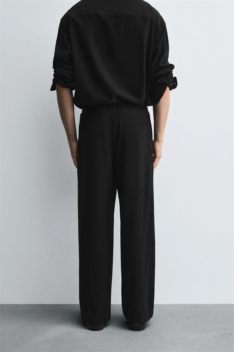 RELAXED FIT FLOWY PANTS
