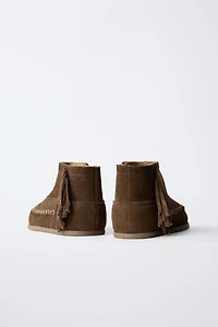 FRINGED LEATHER BOOTS