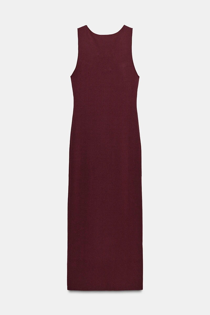 CUT OUT KNIT DRESS WITH METAL DETAIL