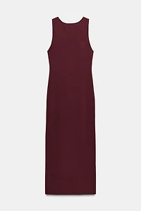 CUT OUT KNIT DRESS WITH METAL DETAIL