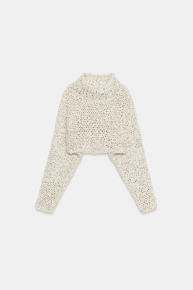 CROPPED KNIT JUMPER WITH INTERTWINED TAPE