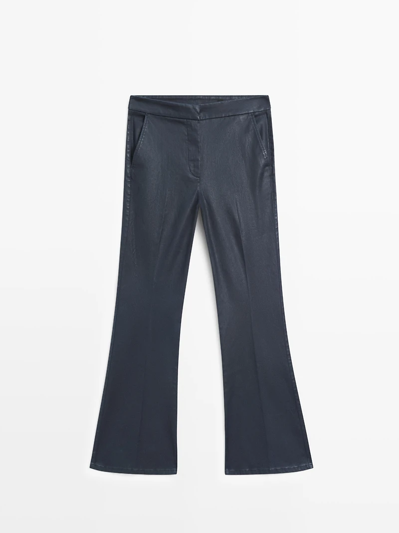 Waxed flare fit trousers