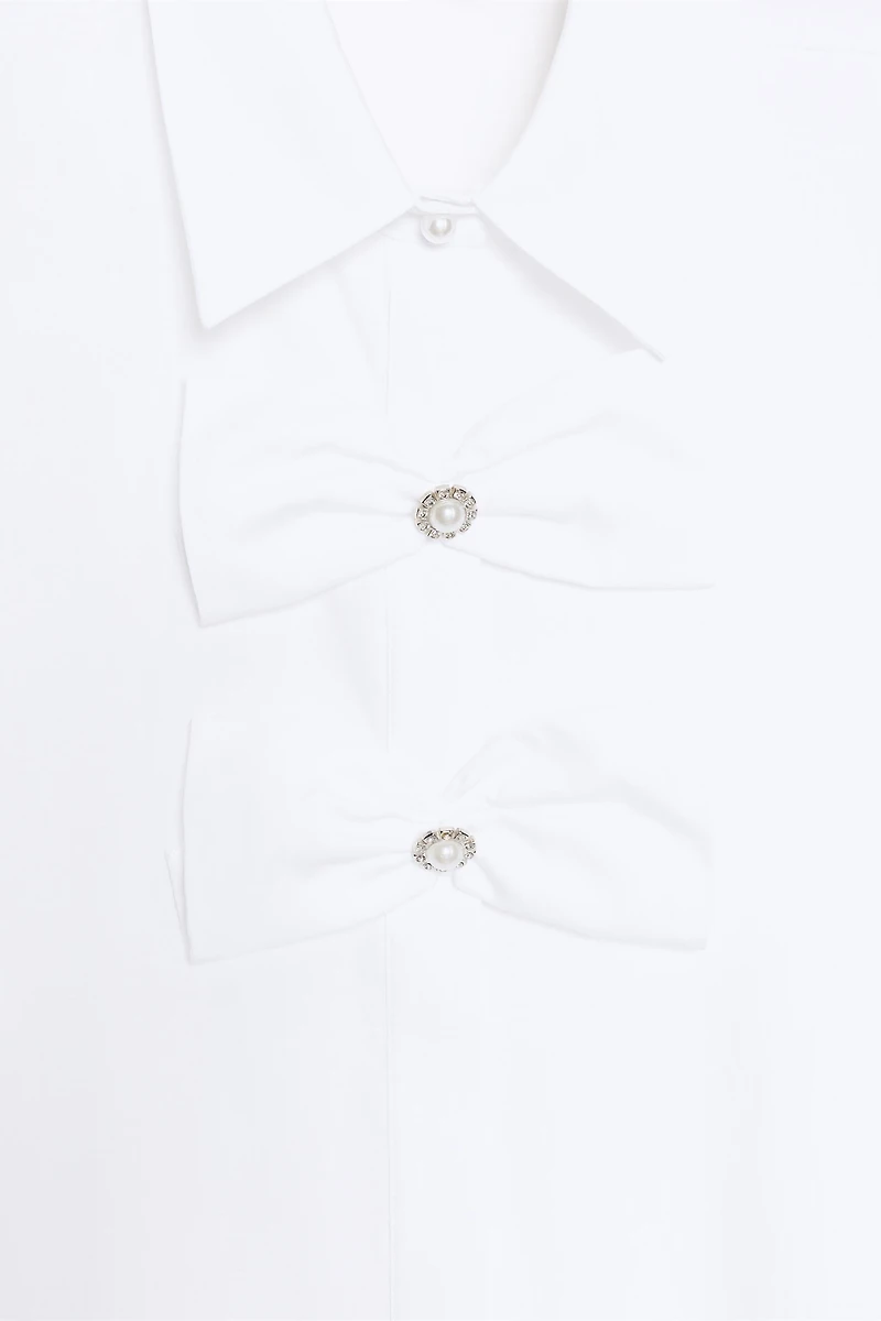 POPLIN SHIRT WITH TIES AND PEARLS