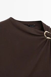 Asymmetric top with rhinestone detail