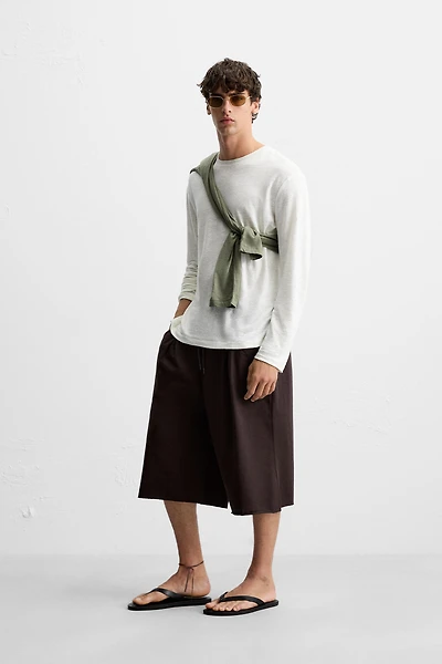 PLEATED OVERSIZED FIT BERMUDA SHORTS
