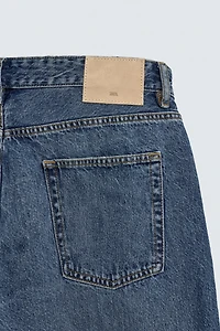 SLIM TAPERED FIT JEANS