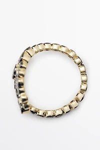 Spiral ring with rhinestones