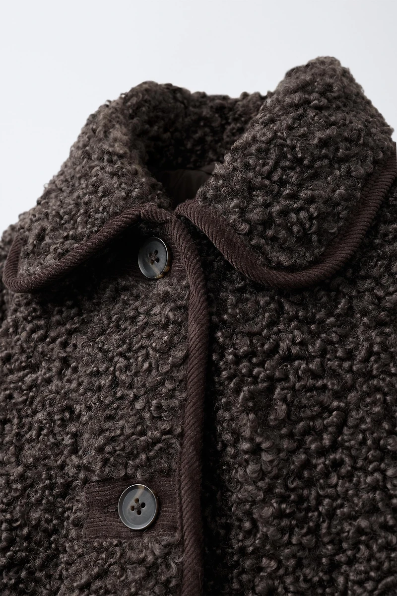 MANTEAU EFFET MOUTON À LISERÉS