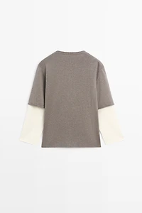 Oversize knit sweater with double sleeve detail