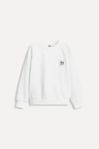 6 ANS/ SWEAT POCHE ÉTIQUETTE 50TH ANNIVERSARY