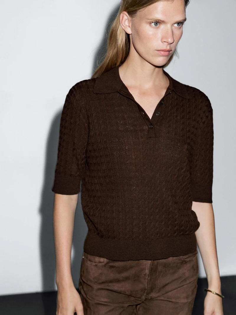 Polo laine en maille tressée