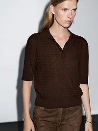 Polo laine en maille tressée