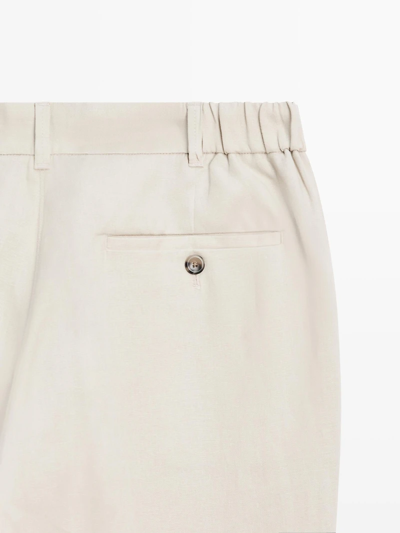 Tapered fit linen trousers