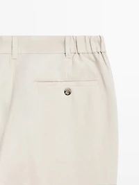 Tapered fit linen trousers