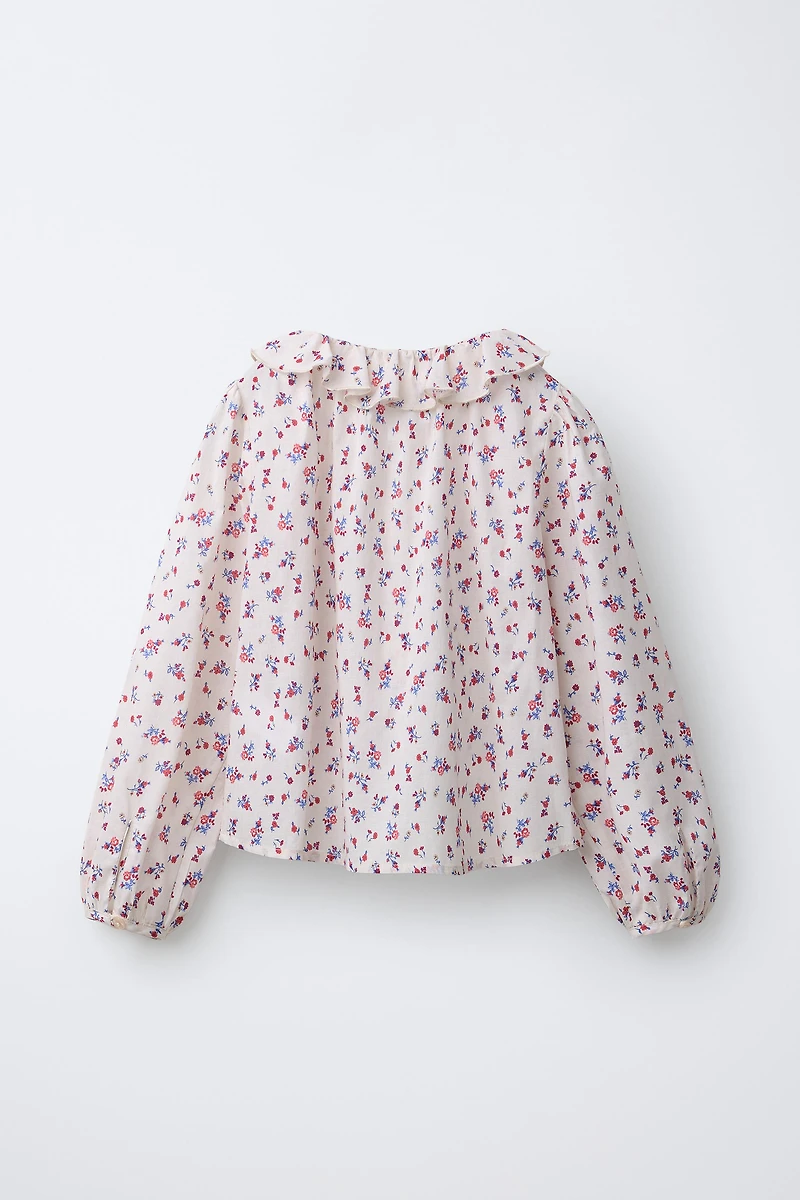 CHEMISE À FLEURS AVEC VOLANT