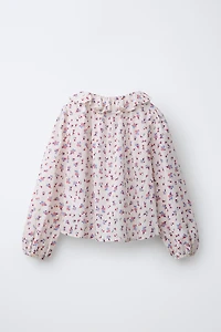 CHEMISE À FLEURS AVEC VOLANT