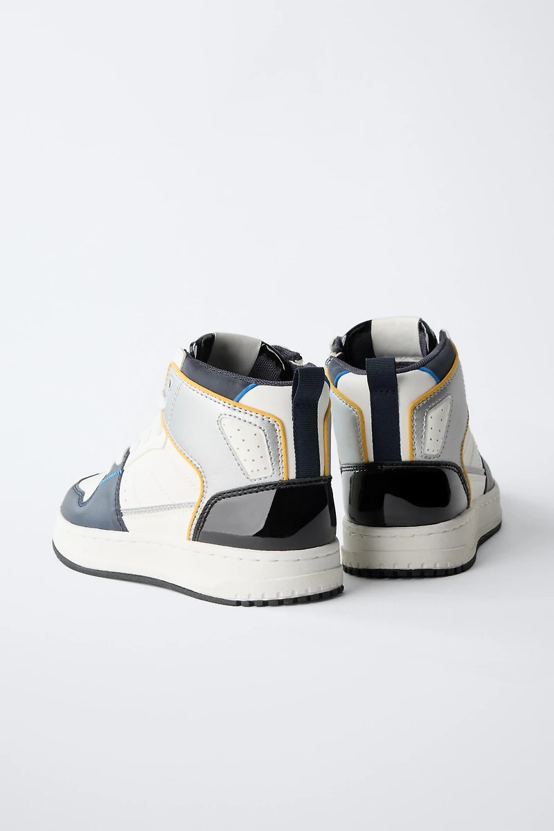 HIGH TOP SNEAKERS WITH PIECES