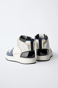 HIGH TOP SNEAKERS WITH PIECES