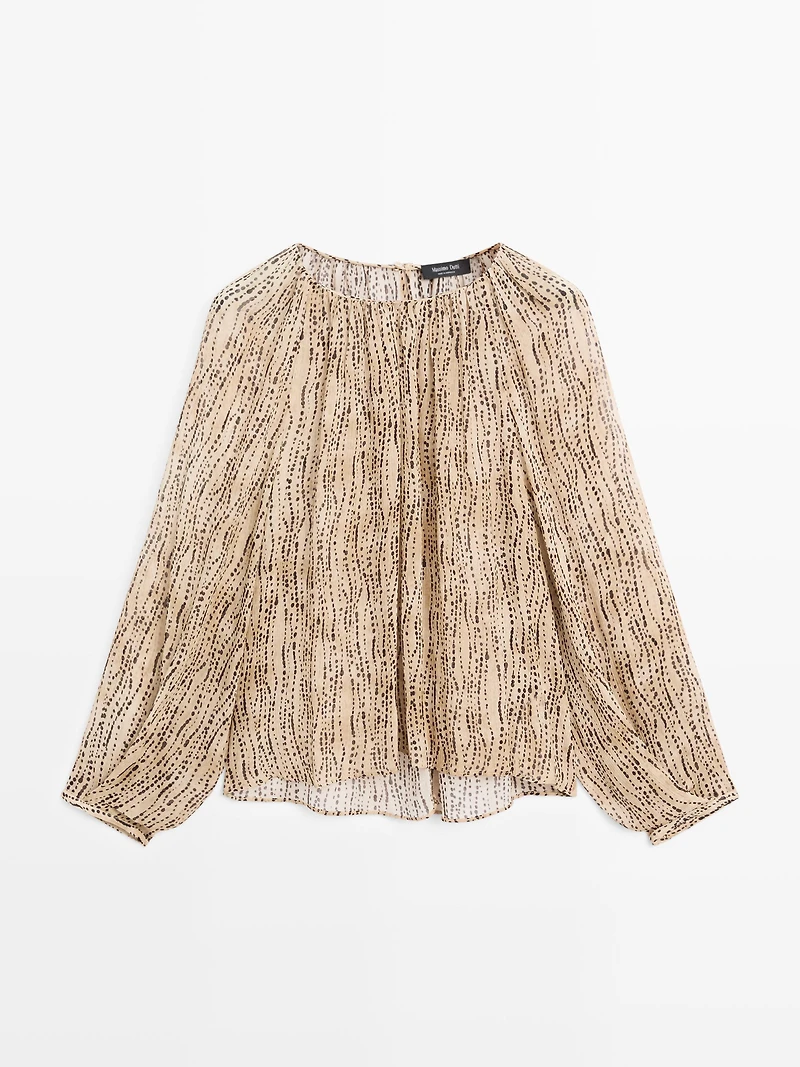 Semi-sheer draped blouse