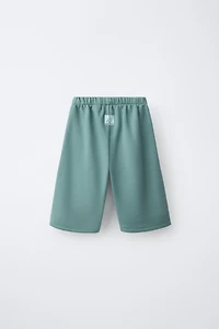 DUCK LABEL WIDE LEG FLEECE PANTS