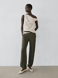 Asymmetric top with knot detail