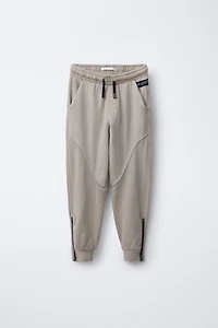 JOGGER PANTS WITH ZIPPERS