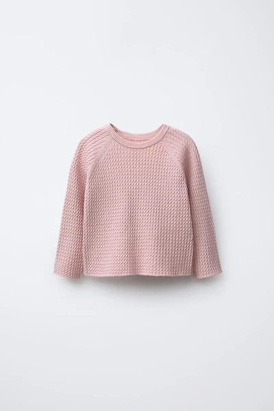 CABLE KNIT SWEATER