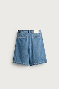 RELAXED FIT PLEATED DENIM CHINO SHORTS