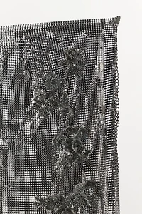 MINI JUPE EN MAILLE À FLEURS ET FANTAISIE