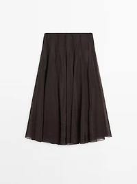 Long voluminous skirt with godet detail