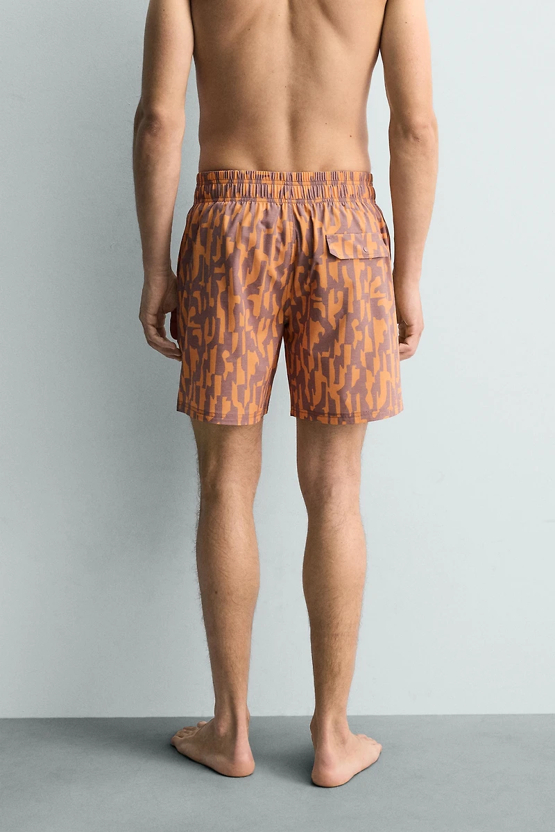 MAILLOT DE BAIN LONG À IMPRIMÉ ABSTRAIT