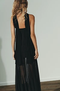 ROBE TRANSPARENTE ET BIMATIÈRE