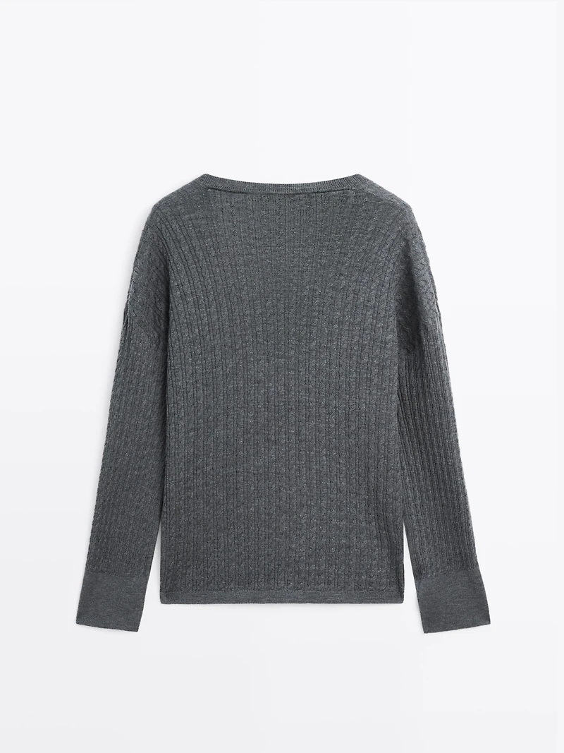 V-neck cable-knit sweater