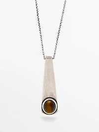 Geometric pendant with stone