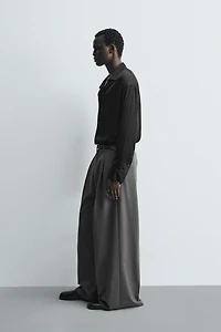 PANTALON COUPE LARGE PLIS