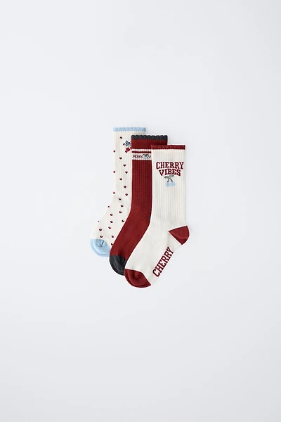 THREE-PACK OF CHERRY AND TEXT SOCKS