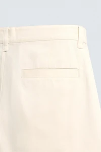 BALLOON FIT PLEATED PANTS