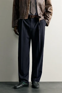 RELAXED FIT PLEATED PANTS