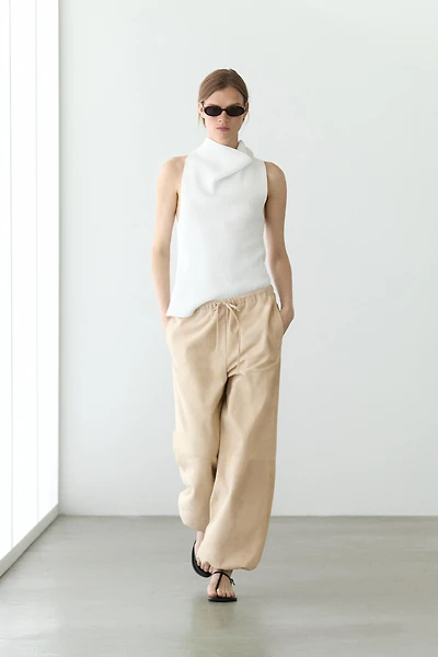 Pantalon bouffant en cuir et daim