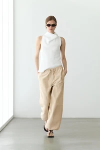 Pantalon bouffant en cuir et daim