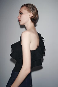 ASYMMETRIC BODYSUIT WITH CONTRASTING RUFFLE