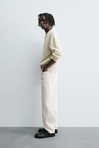 RELAXED FIT BUTTON-NECK SWEATER