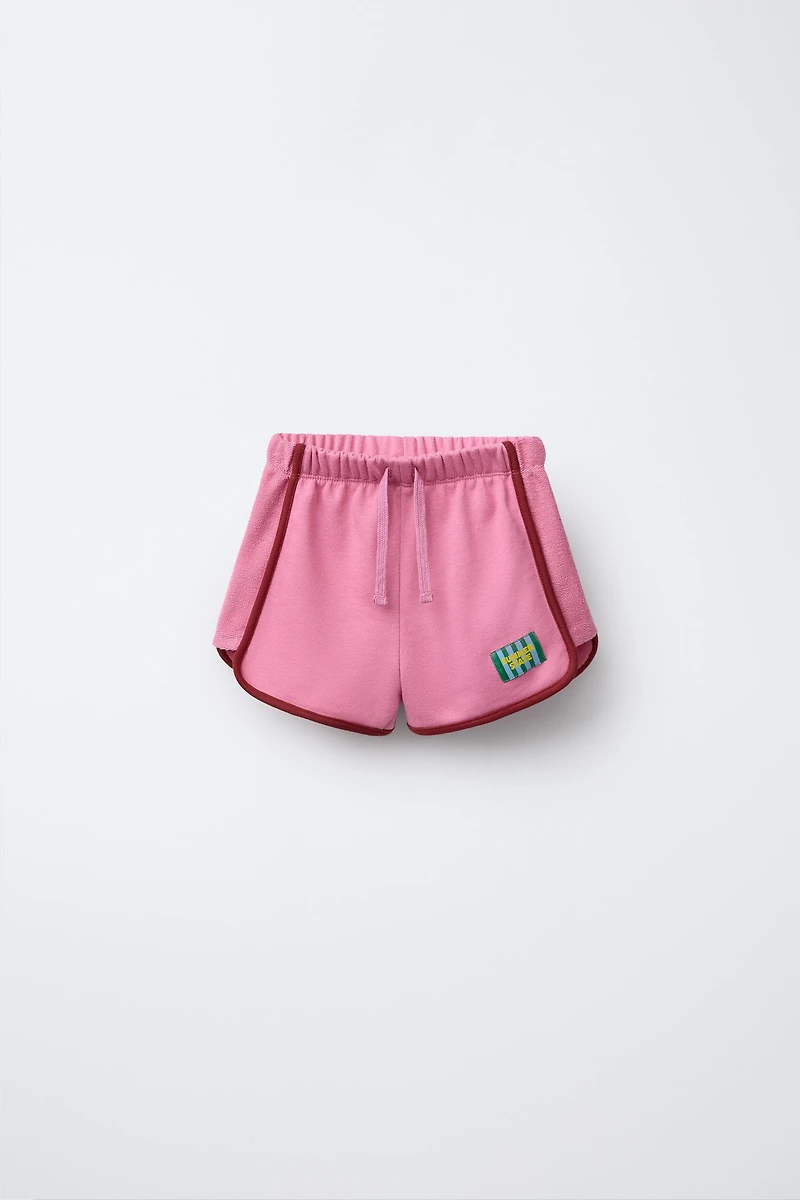 BERMUDA COMBINÉE ÉTIQUETTE