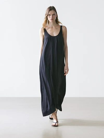 Flowing flared dress with straps
