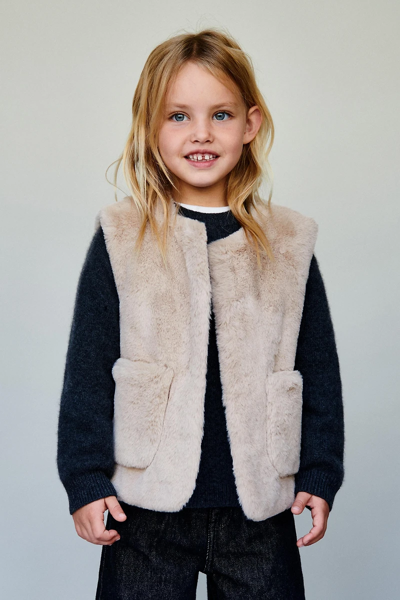 GILET EN FAUSSE FOURRURE