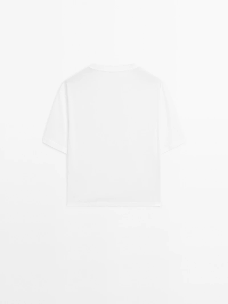 T-shirt oversize couture apparente