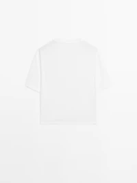 T-shirt oversize couture apparente